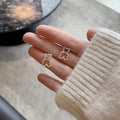 Hollow Pearl Bear Earrings