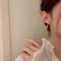 Diamond-studded Bow Tassel Earrings