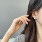 Rhinestone Studded X Pearl Earrings