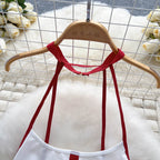 Sweet Bow-tie Hollowed Halter Jumpsuit