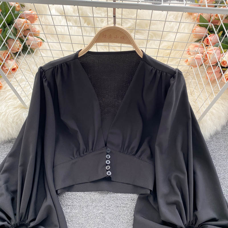 Deep V-neck buttoned short puff sleeve shirt