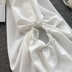 Deep V-neck buttoned short puff sleeve shirt