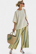 Caterina – sophisticated top and striped linen trousers