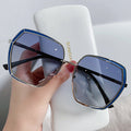 Uv-blocking Sunglasses With Large Border