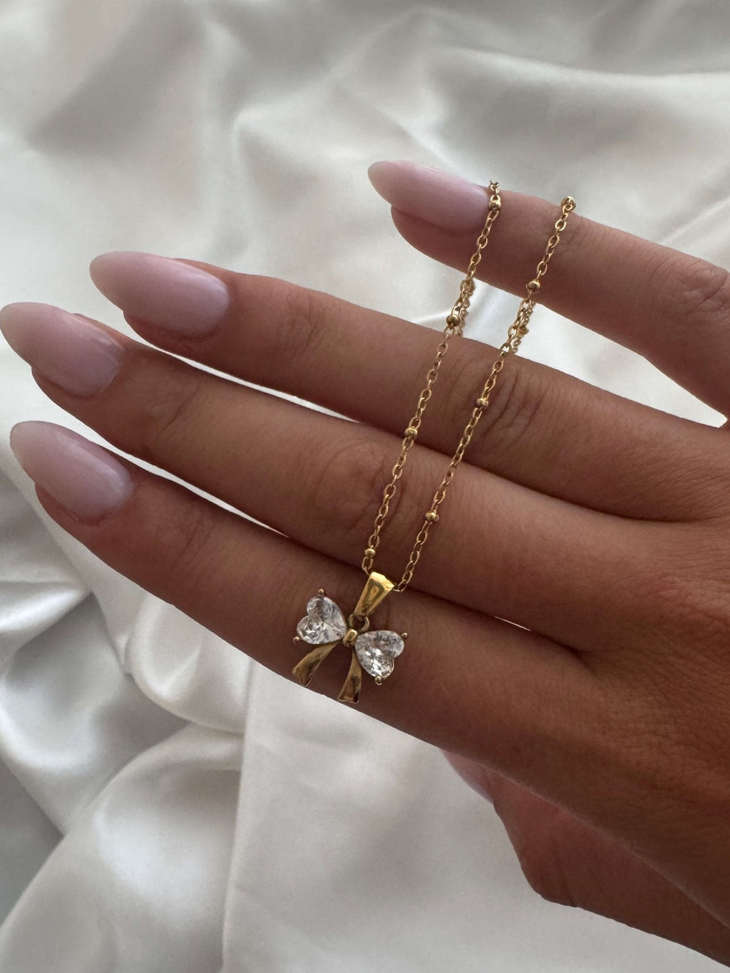 Adaeze Zirconia Bow Pendant Necklace
