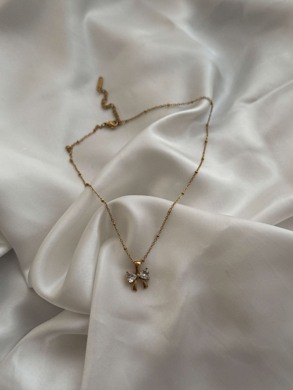 Adaeze Zirconia Bow Pendant Necklace