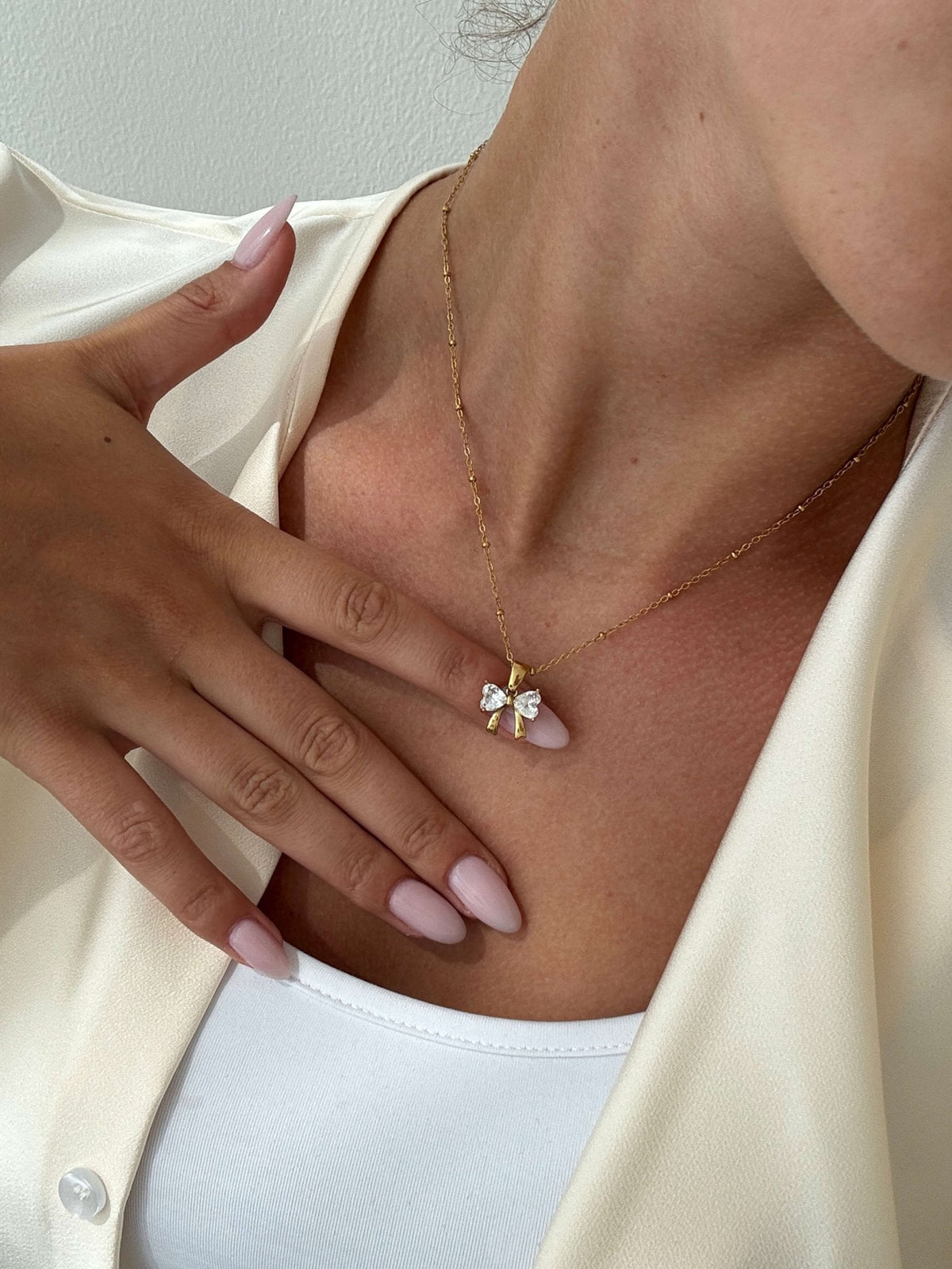 Adaeze Zirconia Bow Pendant Necklace