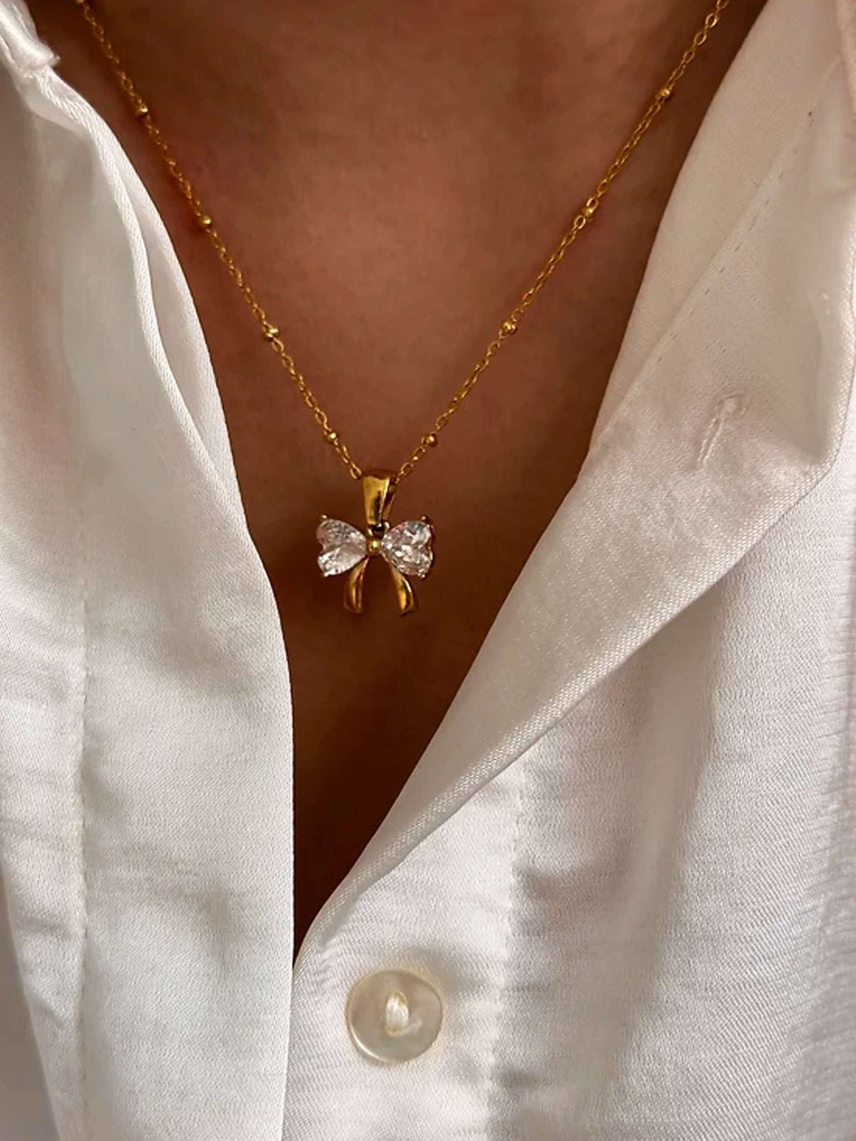 Adaeze Zirconia Bow Pendant Necklace