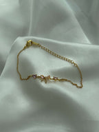 Aetria Zirconia Bow Detail Chain Bracelet