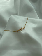 Aetria Zirconia Bow Detail Chain Bracelet