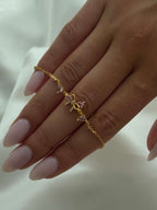 Aetria Zirconia Bow Detail Chain Bracelet