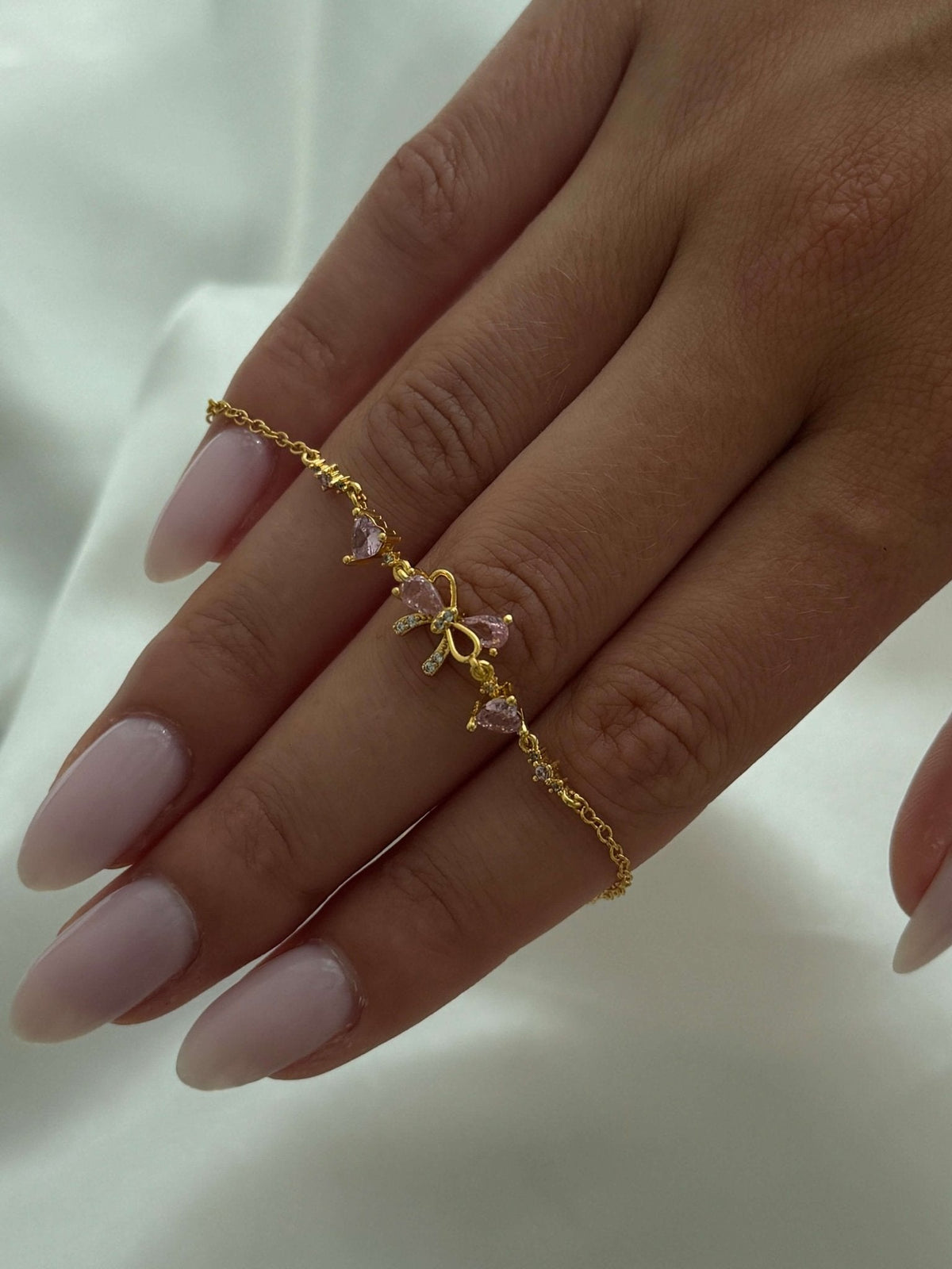 Aetria Zirconia Bow Detail Chain Bracelet